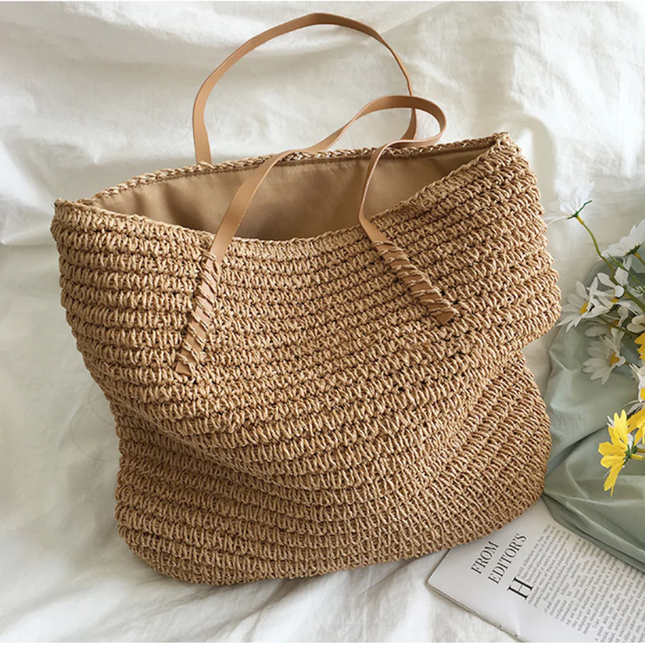 Elegant Woven Handbag with Sturdy Shoulder Strap for Stylish Versatility 0