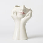 Face in two hands